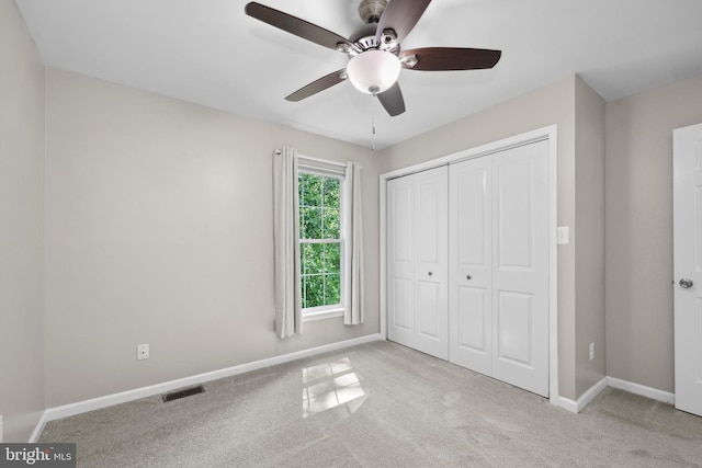 7883 Leroux Ln, Manassas, VA 20112 - unfurnished bedroom with carpet, baseboards, a closet, and ceiling fan