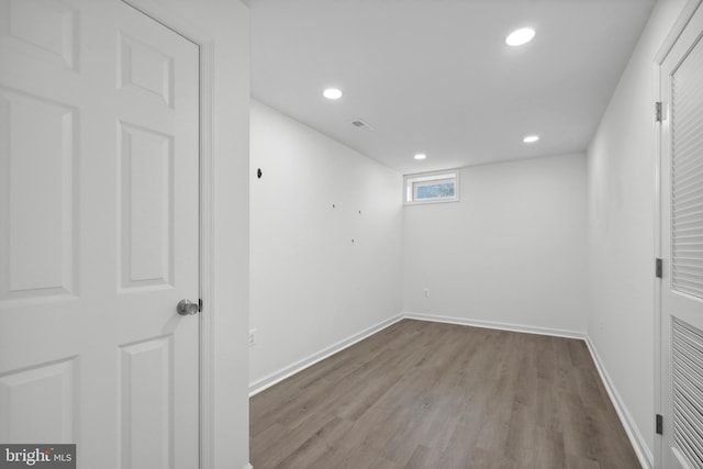 7883 Leroux Ln, Manassas, VA 20112 - basement featuring wood finished floors, baseboards, and recessed lighting