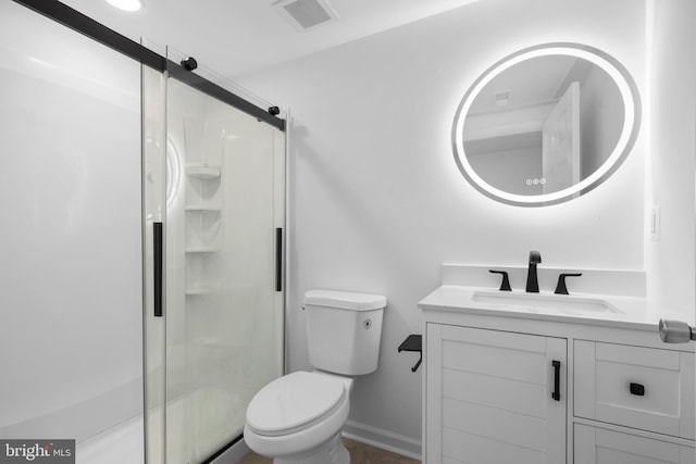 7883 Leroux Ln, Manassas, VA 20112 - full bath featuring toilet, a stall shower, vanity, and baseboards