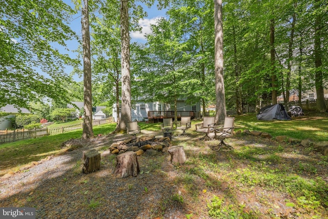 7883 Leroux Ln, Manassas, VA 20112 - view of yard featuring fence and a wooden deck