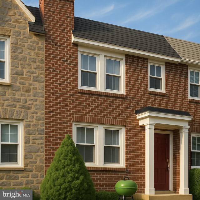 209 Glendale Rd, Upper Darby, PA 19082 - exterior space featuring a chimney, brick siding, and stone siding