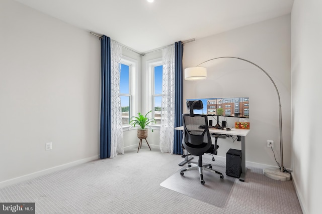 office with baseboards and carpet flooring