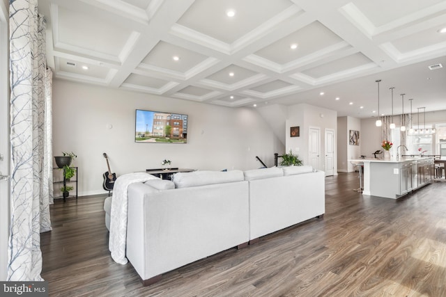 living room featuring dark wood-style flooring, recessed lighting, and baseboards