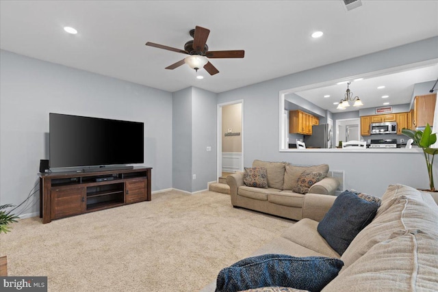 3565 Hummock Pl, Woodbridge, VA 22192 - living room featuring ceiling fan, recessed lighting, a chandelier, light carpet, and baseboards