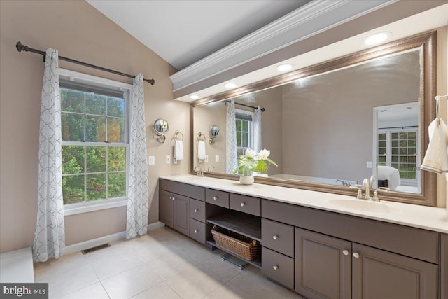 3565 Hummock Pl, Woodbridge, VA 22192 - full bath featuring vaulted ceiling, plenty of natural light, double vanity, and baseboards
