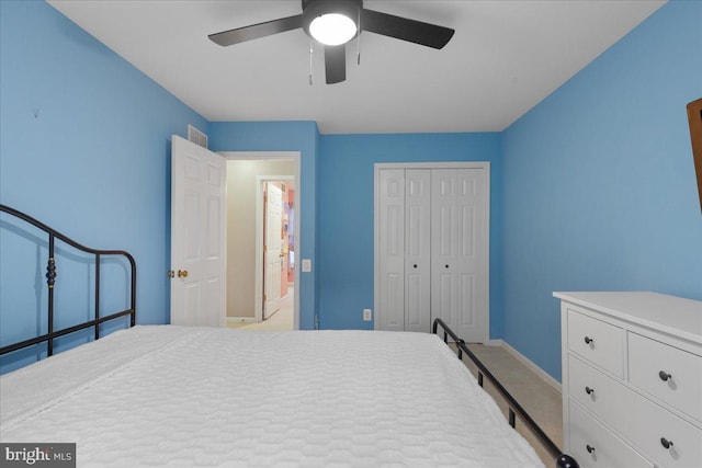 3565 Hummock Pl, Woodbridge, VA 22192 - bedroom featuring baseboards, a closet, light carpet, and ceiling fan