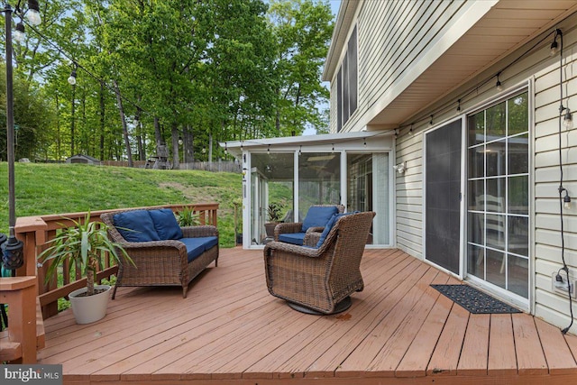 3565 Hummock Pl, Woodbridge, VA 22192 - wooden deck with a sunroom, a yard, and outdoor lounge area