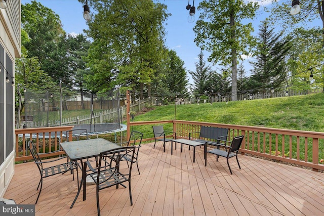 3565 Hummock Pl, Woodbridge, VA 22192 - wooden terrace with a trampoline and outdoor dining space