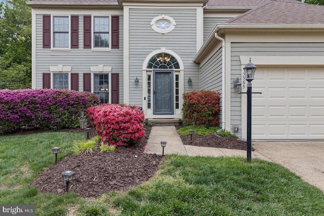 3565 Hummock Pl, Woodbridge, VA 22192 - property entrance featuring a garage and roof with shingles