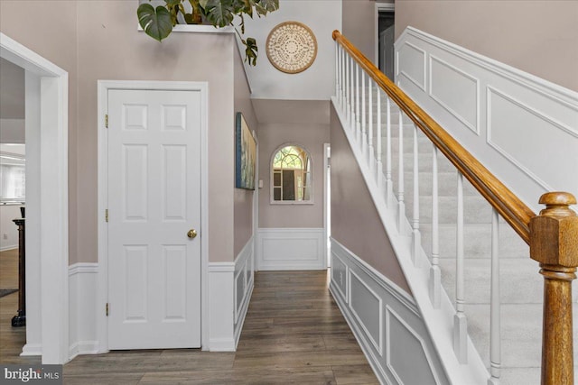 3565 Hummock Pl, Woodbridge, VA 22192 - stairway with wood finished floors and a wainscoted wall