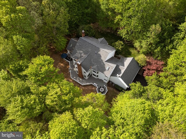aerial view featuring a view of trees