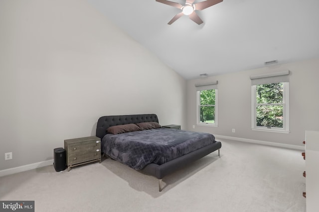 bedroom with baseboards, carpet flooring, vaulted ceiling, and visible vents