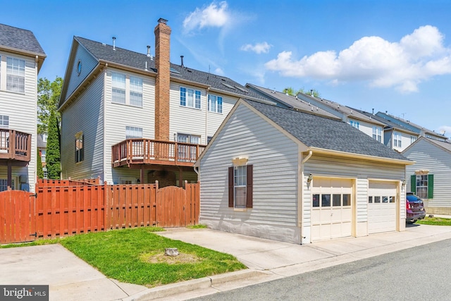 13014 Prairie Knoll Ct, Germantown, MD 20874 - rear view of house featuring a gate, a chimney, a shingled roof, an attached garage, and fence