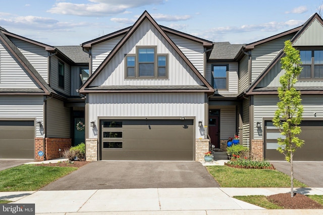 7193 Wolf Trap Court Caroline, Glen Burnie, MD 21060 - craftsman house with board and batten siding, aphalt driveway, and brick siding