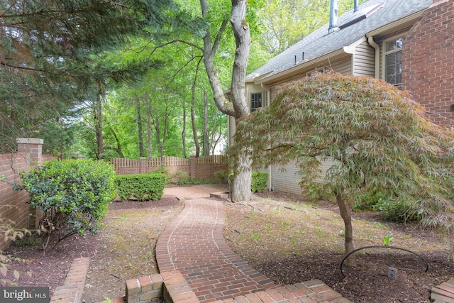 view of yard featuring fence