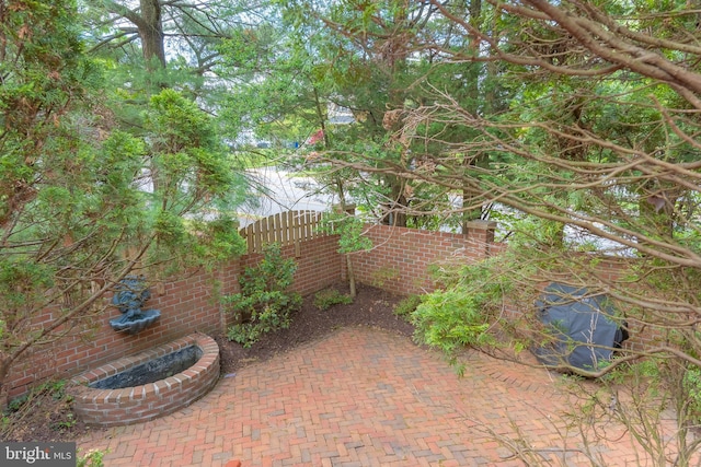 view of patio with fence