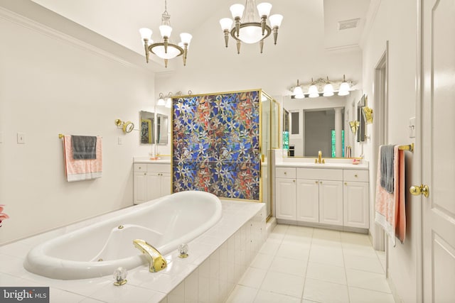 bathroom featuring tile patterned flooring, a tub with jets, a shower stall, a sink, and a notable chandelier