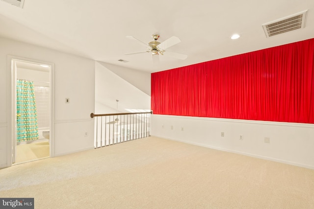 carpeted spare room featuring ceiling fan, baseboards, visible vents, and recessed lighting