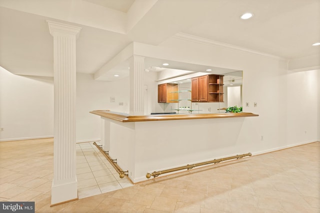 kitchen with recessed lighting, open shelves, light tile patterned flooring, and decorative columns