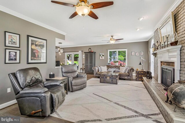 2840 Dunleigh Dr, Dunkirk, MD 20754 - living area with baseboards, ornamental molding, ceiling fan, and a fireplace