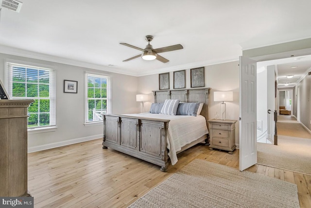 2840 Dunleigh Dr, Dunkirk, MD 20754 - bedroom with visible vents, baseboards, crown molding, and light wood-type flooring