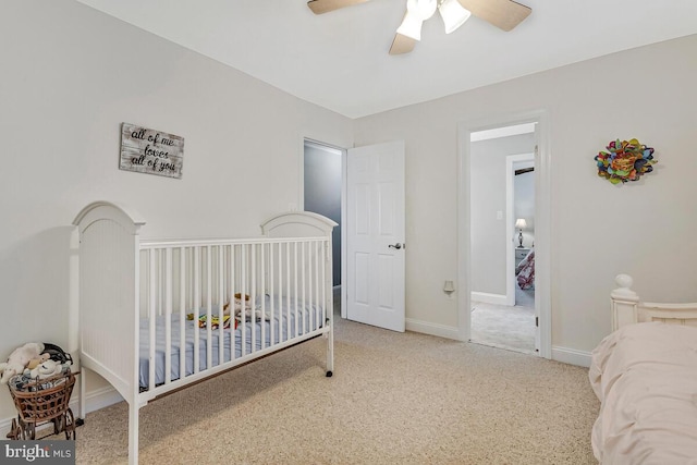 2840 Dunleigh Dr, Dunkirk, MD 20754 - bedroom featuring baseboards, ceiling fan, carpet flooring, and a nursery area