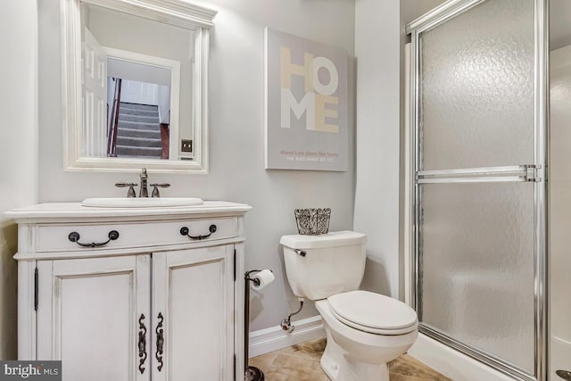 2840 Dunleigh Dr, Dunkirk, MD 20754 - bathroom with toilet, baseboards, a shower stall, and vanity