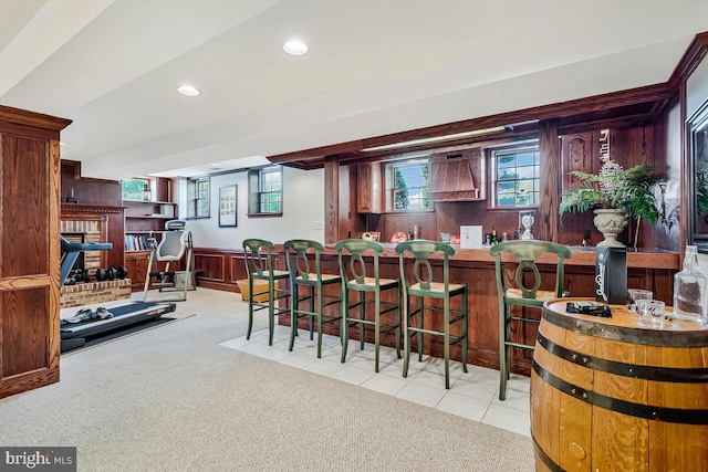2840 Dunleigh Dr, Dunkirk, MD 20754 - bar with carpet floors, a brick fireplace, tile patterned floors, indoor wet bar, and recessed lighting