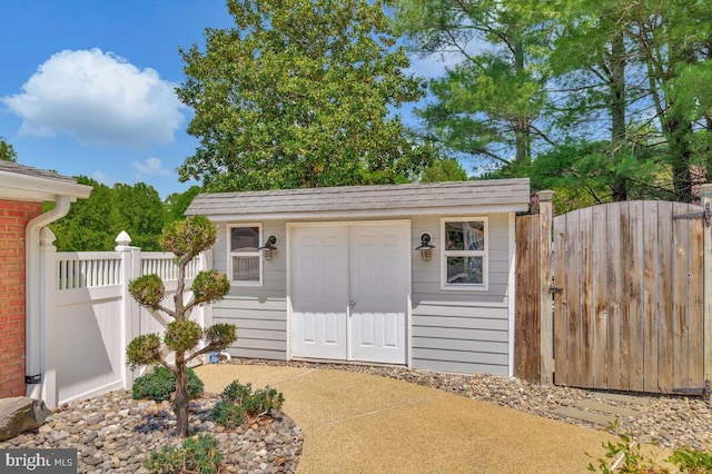 2840 Dunleigh Dr, Dunkirk, MD 20754 - view of outdoor structure with an outdoor structure, a gate, and fence