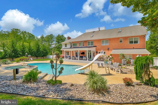 2840 Dunleigh Dr, Dunkirk, MD 20754 - view of swimming pool with a patio, a water slide, a fenced in pool, and fence