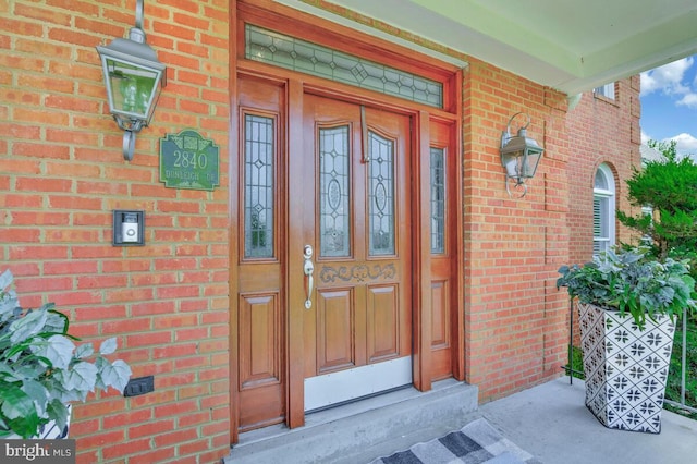2840 Dunleigh Dr, Dunkirk, MD 20754 - entrance to property featuring brick siding and a porch