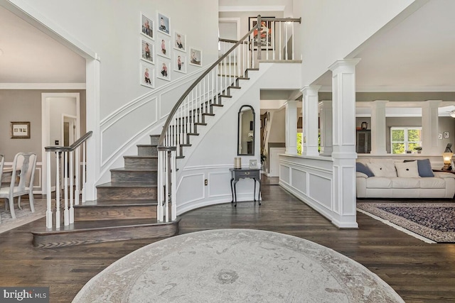2840 Dunleigh Dr, Dunkirk, MD 20754 - entryway featuring decorative columns, wood finished floors, stairway, and a decorative wall