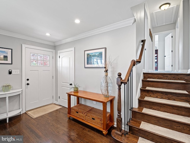 entrance foyer with a wealth of natural light, crown molding, dark wood-style floors, and recessed lighting