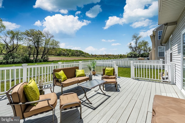 deck with a yard, an outdoor hangout area, and a fenced backyard