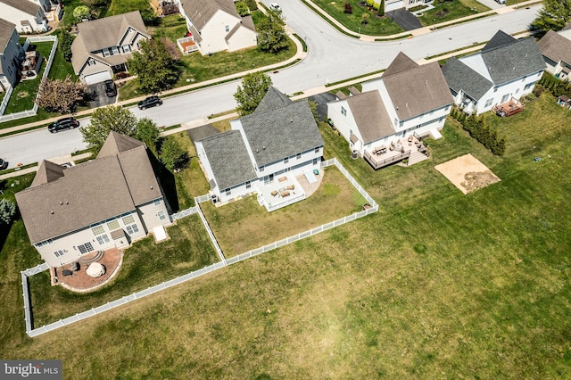 birds eye view of property with a residential view