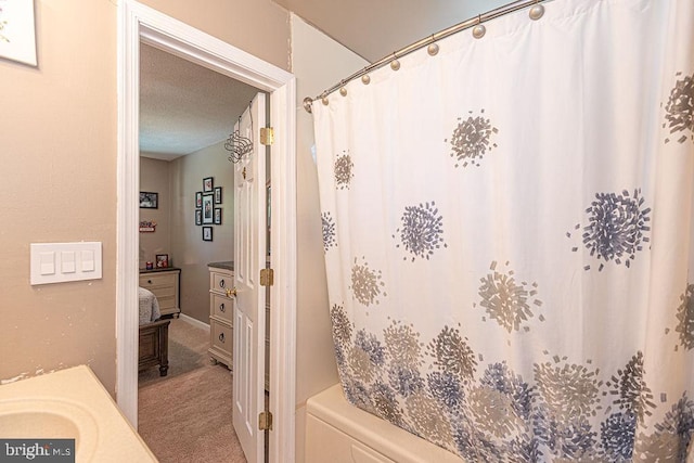 8 Candytuft Ln, Ocean Pines, MD 21811 - bathroom featuring baseboards and a textured ceiling