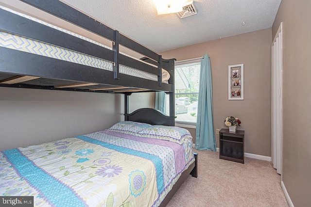 8 Candytuft Ln, Ocean Pines, MD 21811 - bedroom with baseboards, carpet floors, and a textured ceiling