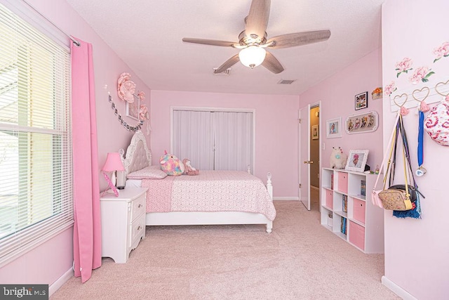 8 Candytuft Ln, Ocean Pines, MD 21811 - bedroom with light colored carpet, visible vents, multiple windows, and baseboards