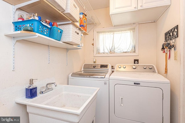 8 Candytuft Ln, Ocean Pines, MD 21811 - washroom with washing machine and clothes dryer, cabinet space, and a sink