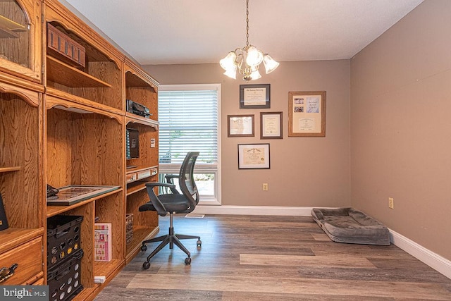 8 Candytuft Ln, Ocean Pines, MD 21811 - home office with an inviting chandelier, dark wood-type flooring, and baseboards
