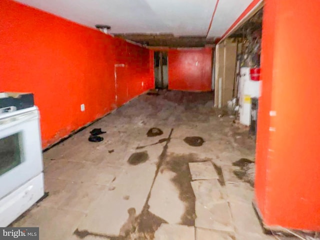 421 E Rockland St, Philadelphia, PA 19120 - interior space featuring unfinished concrete flooring and gas water heater