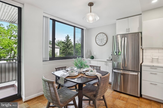 dining area with a healthy amount of sunlight