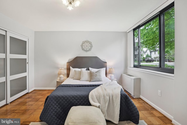 bedroom featuring baseboards