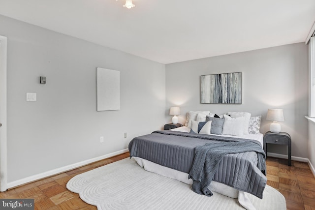 bedroom with baseboards