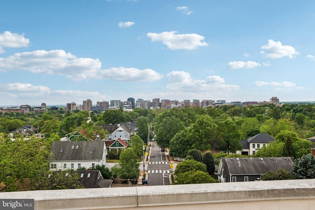 birds eye view of property featuring a view of city
