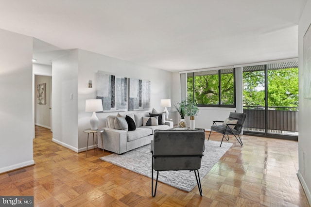 living room featuring baseboards