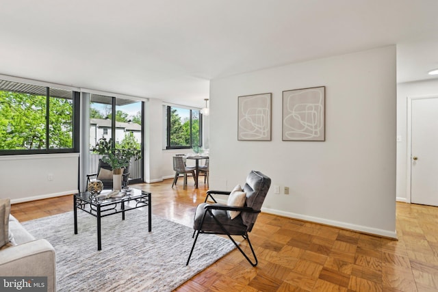 sitting room featuring baseboards