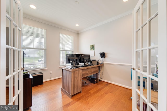 office featuring light wood-type flooring, french doors, baseboards, and ornamental molding