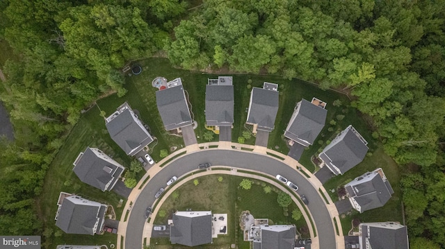 birds eye view of property with a residential view