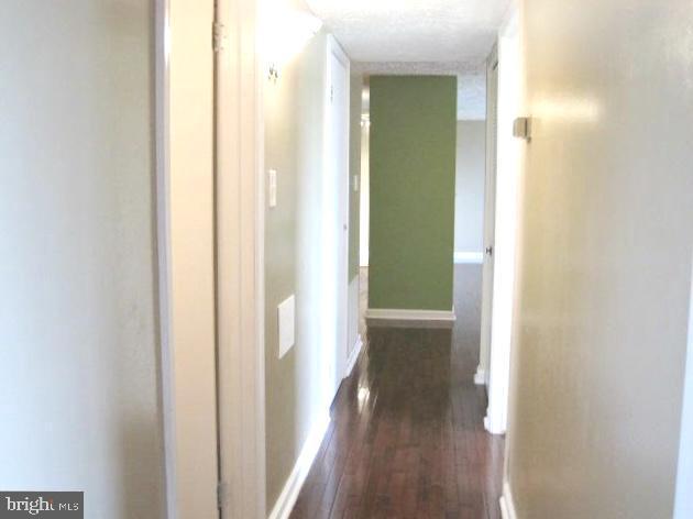 730 Heather Ridge Dr Unit G, Frederick, MD 21702 - hallway with hardwood / wood-style flooring and baseboards